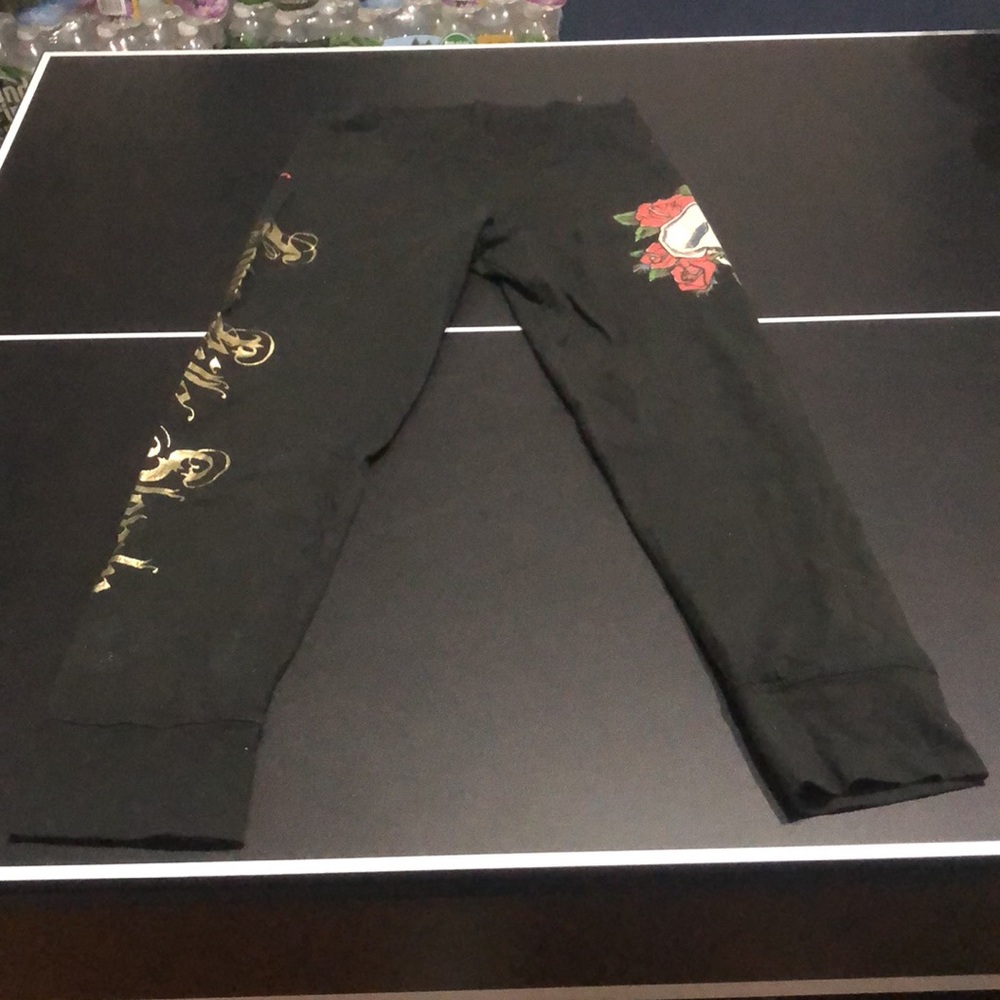 Ed Hardy “Love Kills Slowly” leggings with skull and rose
